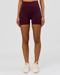 Woman wearing Fusion V-Contour Ultra High-Rise 4" Short Pockets - Cherry Lacquer | Model:Taneisha | Size:XS | Thumbnail Index: 6
