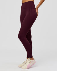 Woman wearing Fusion V-Contour Ultra High-Rise Full Length Legging Pockets - Cherry Lacquer | Model:Taneisha | Size:XS | Thumbnail Index: 3