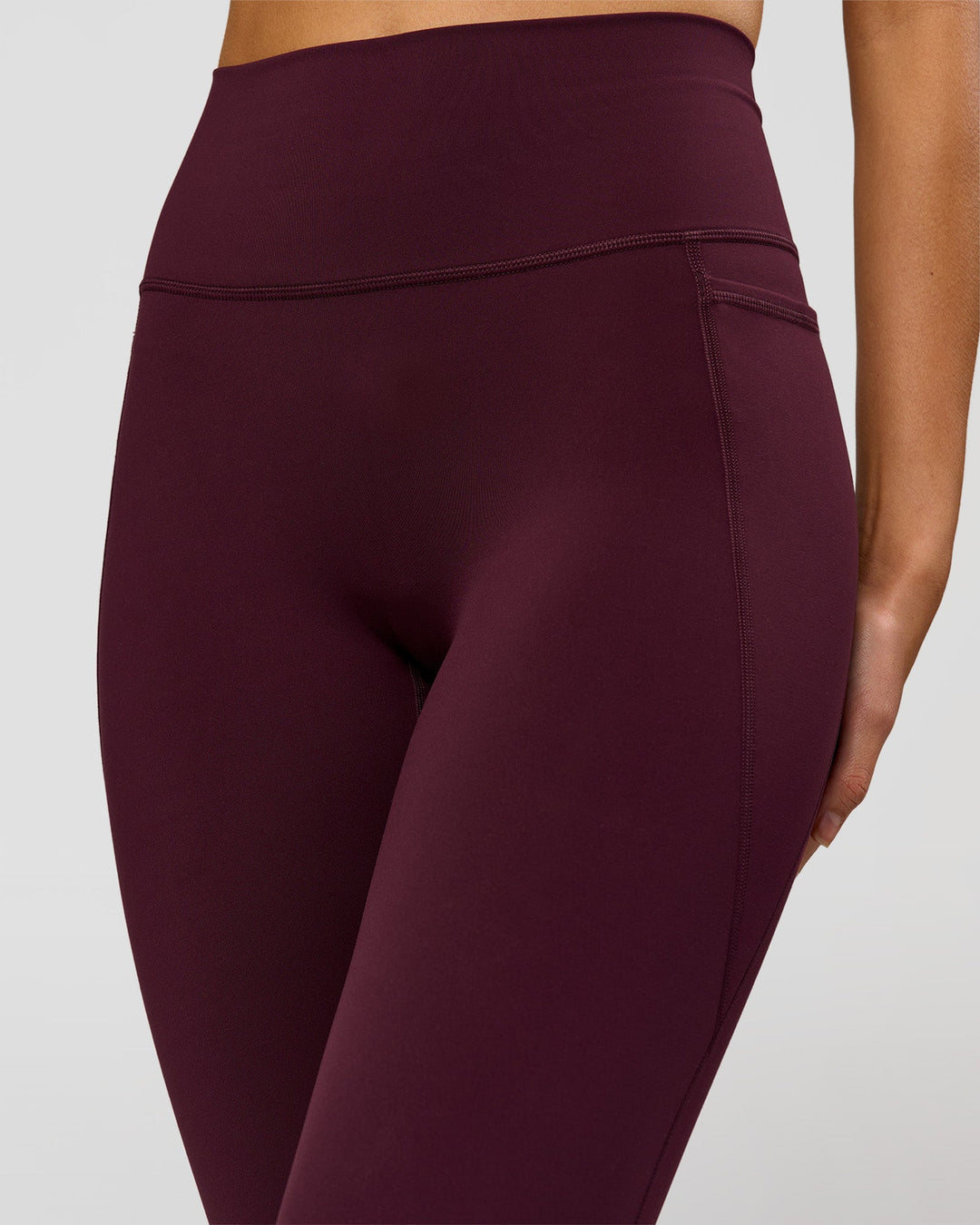 Woman wearing Fusion V-Contour Ultra High-Rise Full Length Legging Pockets - Cherry Lacquer | Model:Taneisha | Size:XS - view 6
