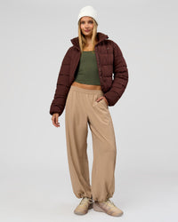 Woman wearing Go-To Puffer Jacket - Hot Chocolate | Model:Taneisha | Size:XS