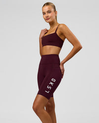 Woman wearing Rep Ultra High-Rise 9" Short Pockets - Cherry Lacquer-White | Model:Taneisha | Size:XS | Thumbnail Index: 0