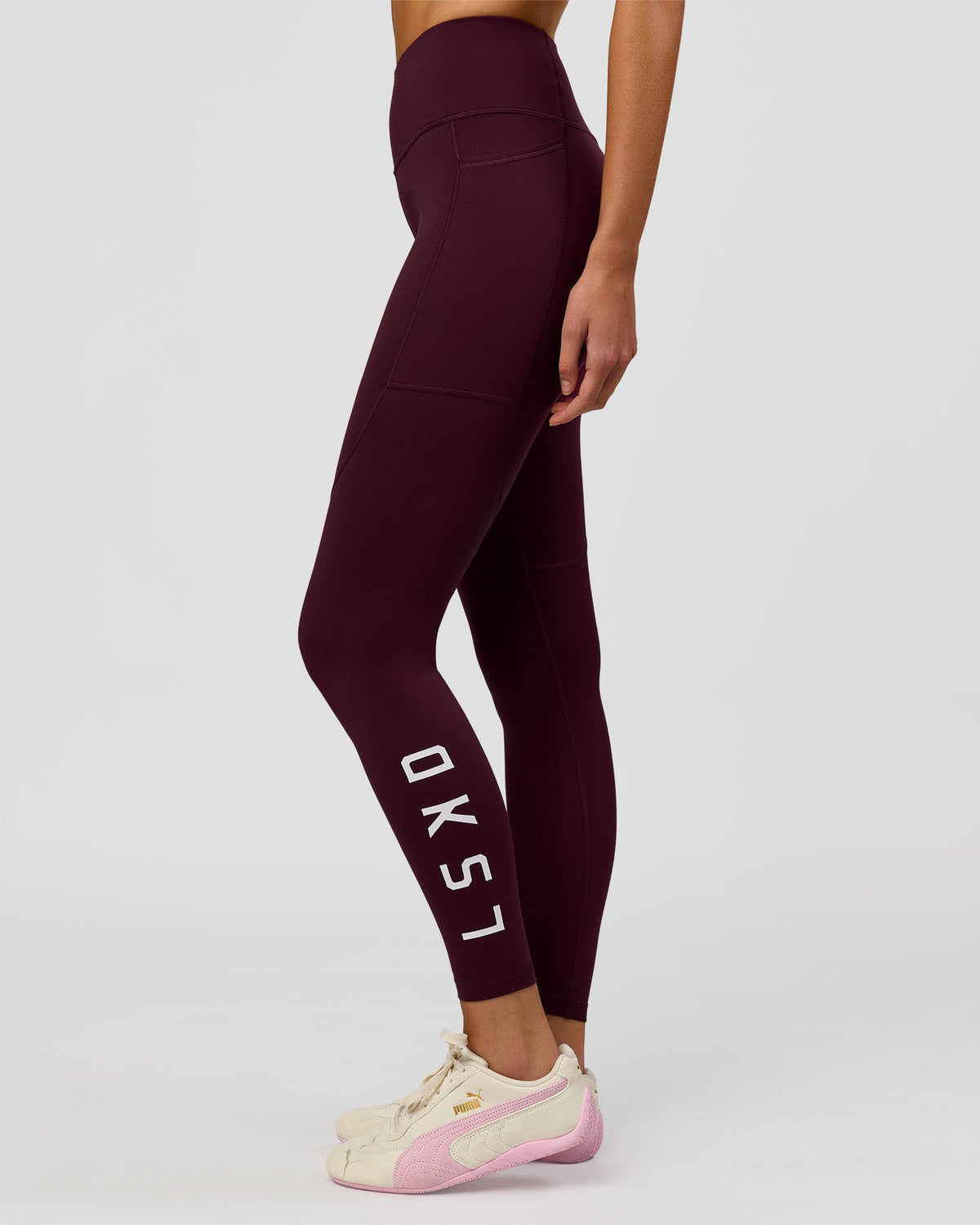 Woman wearing Rep Ultra High-Rise Full Length Legging Pockets - Cherry Lacquer-White | Model:Taneisha | Size:XS
