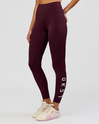 Woman wearing Rep Ultra High-Rise Full Length Legging Pockets - Cherry Lacquer-White | Model:Taneisha | Size:XS | Thumbnail Index: 3