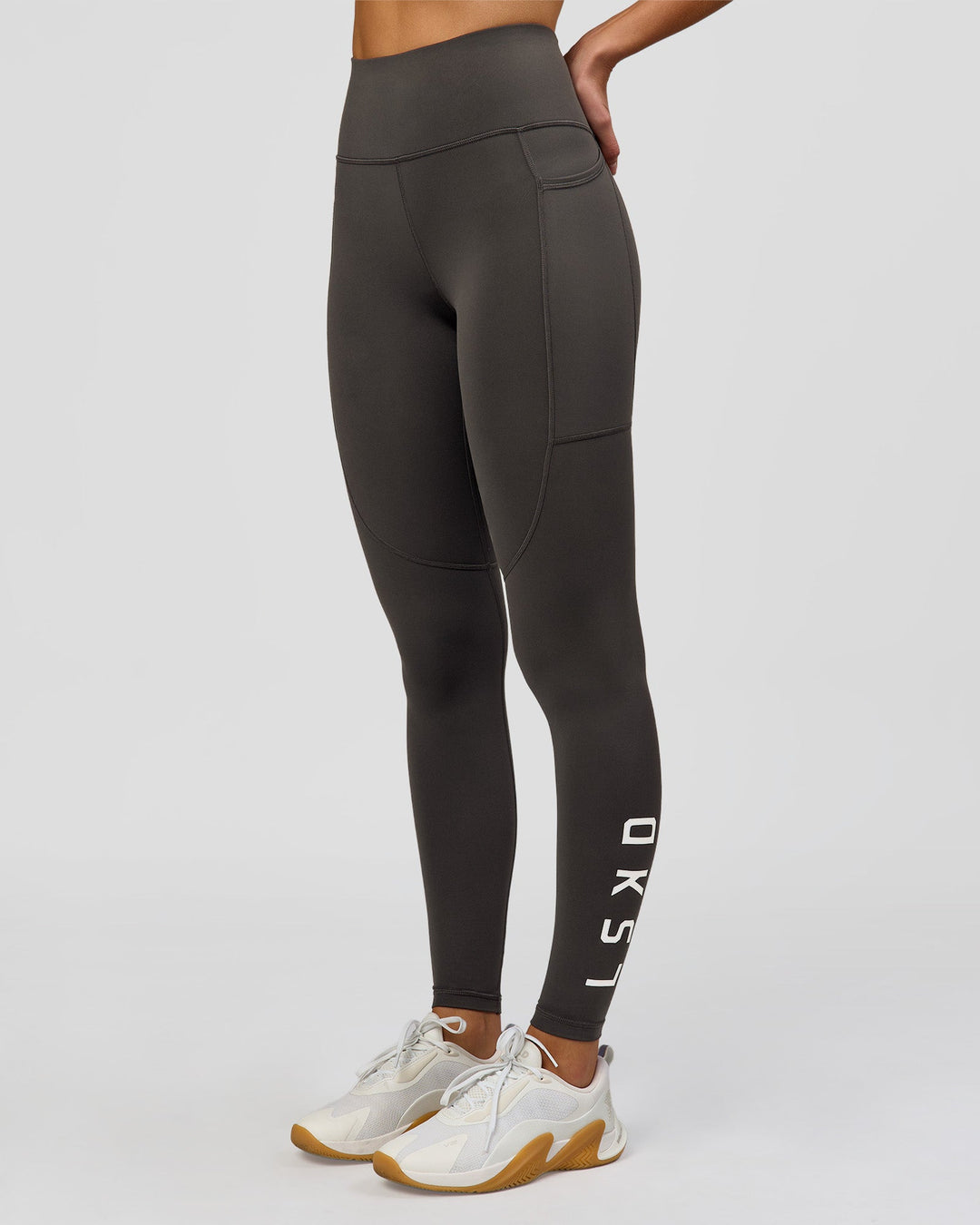 Woman wearing Rep Ultra High-Rise Full Length Legging Pockets - Onyx-white | Model:Taneisha | Size:XS - view 1