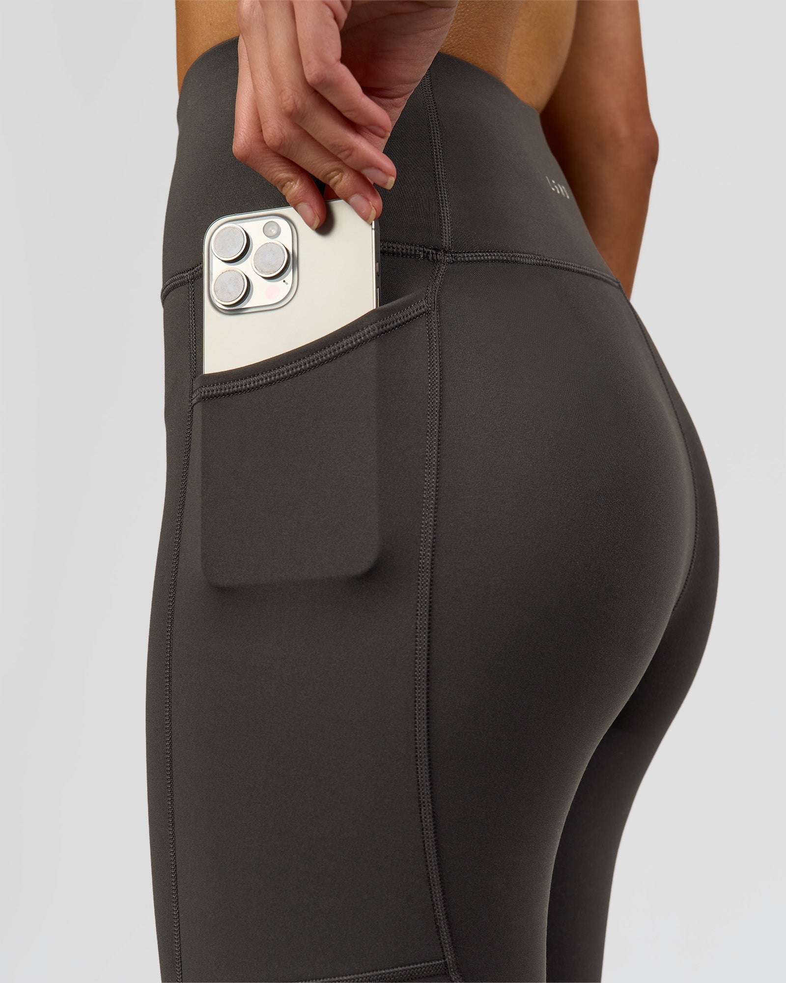 Woman wearing Rep Ultra High-Rise Full Length Legging Pockets - Onyx-white | Model:Taneisha | Size:XS