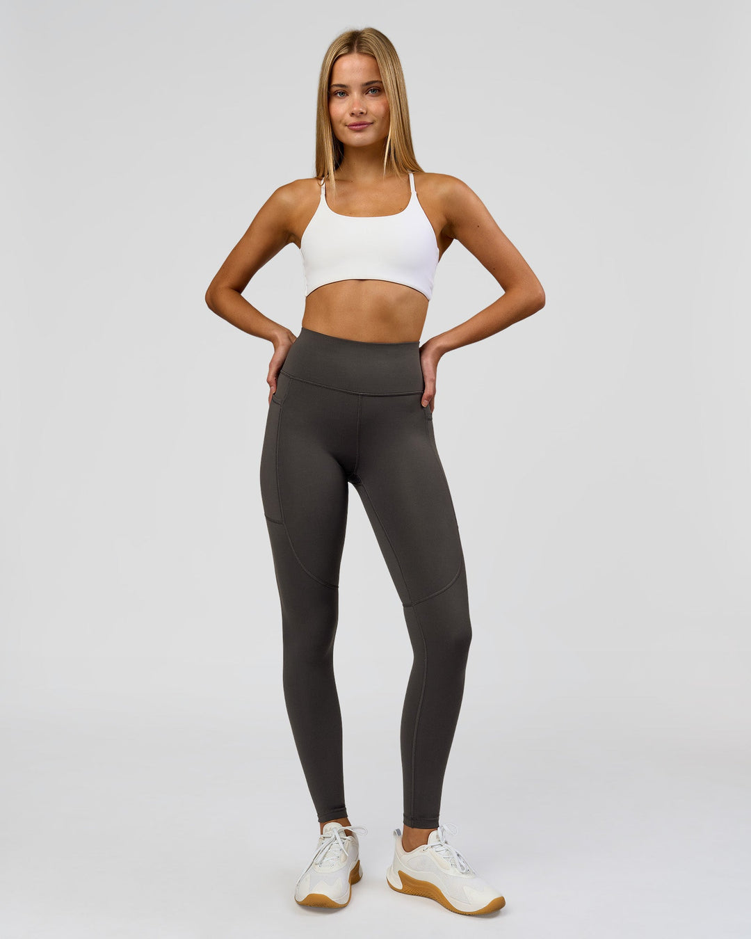 Woman wearing Rep Ultra High-Rise Full Length Legging Pockets - Onyx-white | Model:Taneisha | Size:XS - view 3