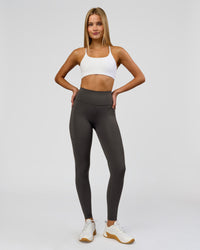 Woman wearing Rep Ultra High-Rise Full Length Legging Pockets - Onyx-white | Model:Taneisha | Size:XS | Thumbnail Index: 2
