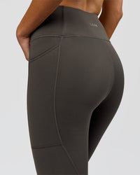 Woman wearing Rep Ultra High-Rise Full Length Legging Pockets - Onyx-white | Model:Taneisha | Size:XS | Thumbnail Index: 4