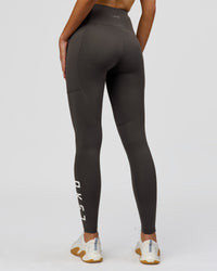 Woman wearing Rep Ultra High-Rise Full Length Legging Pockets - Onyx-white | Model:Taneisha | Size:XS | Thumbnail Index: 6