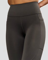 Woman wearing Rep Ultra High-Rise Full Length Legging Pockets - Onyx-white | Model:Taneisha | Size:XS | Thumbnail Index: 7