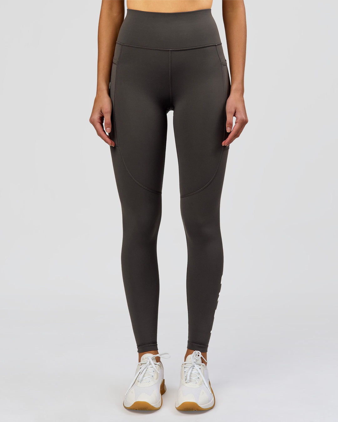 Woman wearing Rep Ultra High-Rise Full Length Legging Pockets - Onyx-white | Model:Taneisha | Size:XS - view 10