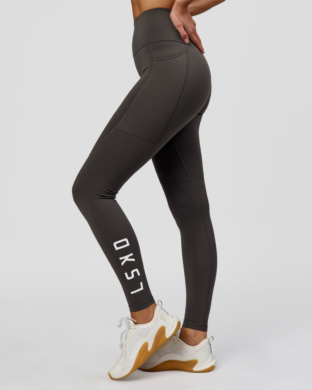 Woman wearing Rep Ultra High-Rise Full Length Legging Pockets - Onyx-white | Model:Taneisha | Size:XS - view 11
