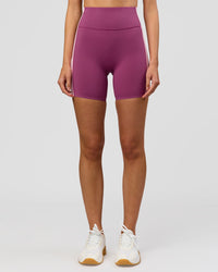 Woman wearing Revitalise Ultra High-Rise 6" Short - Boysenberry-Pink Rose | Model:Taneisha | Size:XS | Thumbnail Index: 5