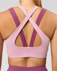 Woman wearing Stamina Layered Sports Bra - Boysenberry-Pink Rose | Model:Taneisha | Size:XS | Thumbnail Index: 4