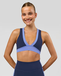 Woman wearing Stamina Layered Sports Bra - Future Navy-Bluebell | Model:Taneisha | Size:XS | Thumbnail Index: 5