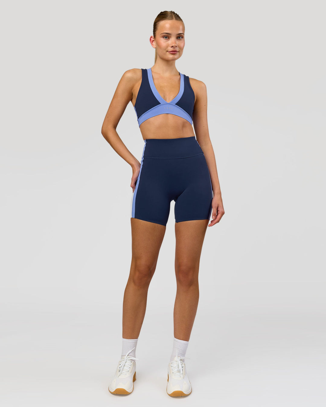 Woman wearing Stamina Layered Sports Bra - Future Navy-Bluebell | Model:Taneisha | Size:XS - view 7