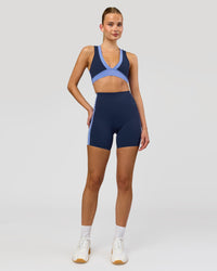 Woman wearing Stamina Layered Sports Bra - Future Navy-Bluebell | Model:Taneisha | Size:XS | Thumbnail Index: 6