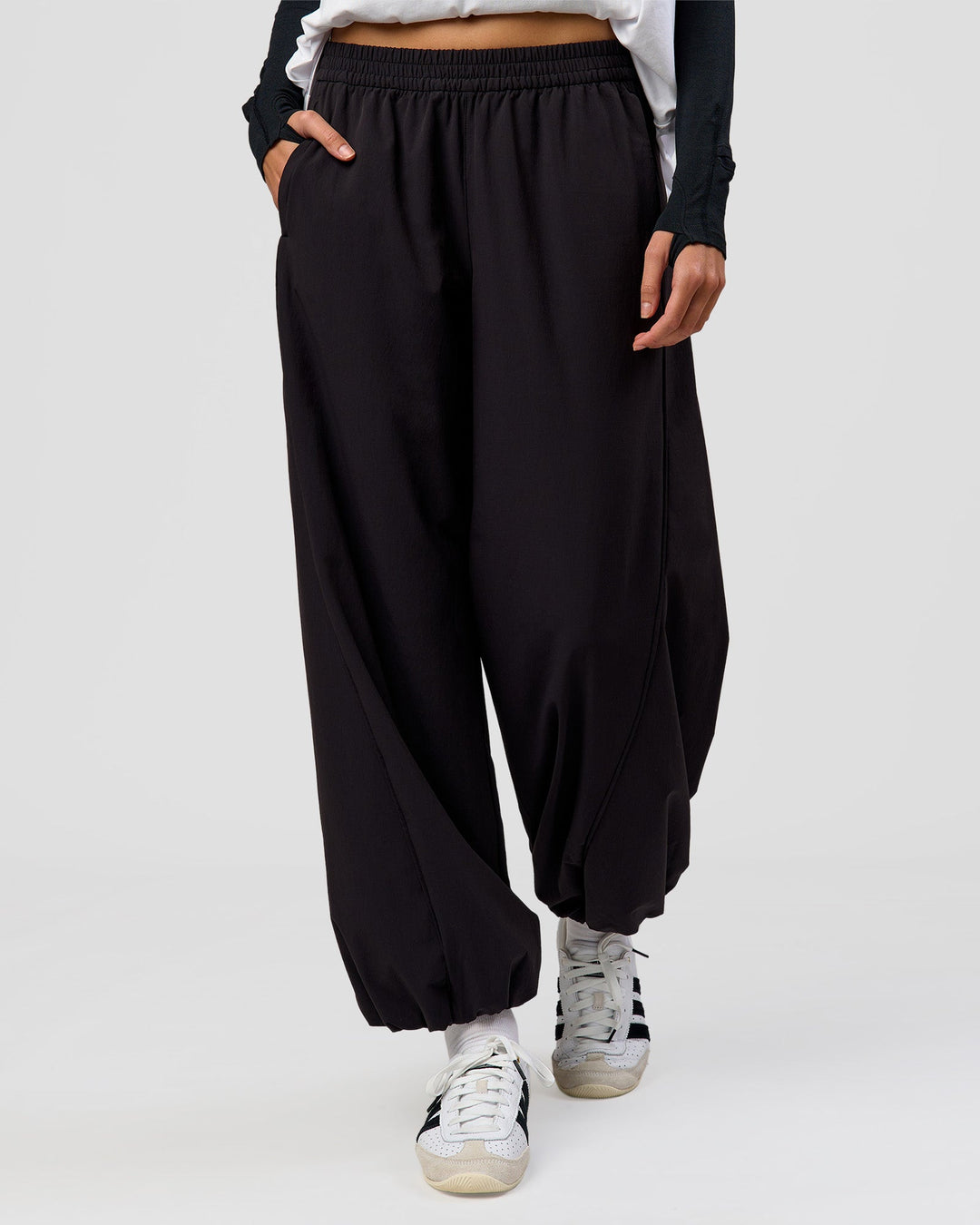Woman wearing Stitch Up Track Pant - Black | Model:Taneisha | Size:XS - view 2