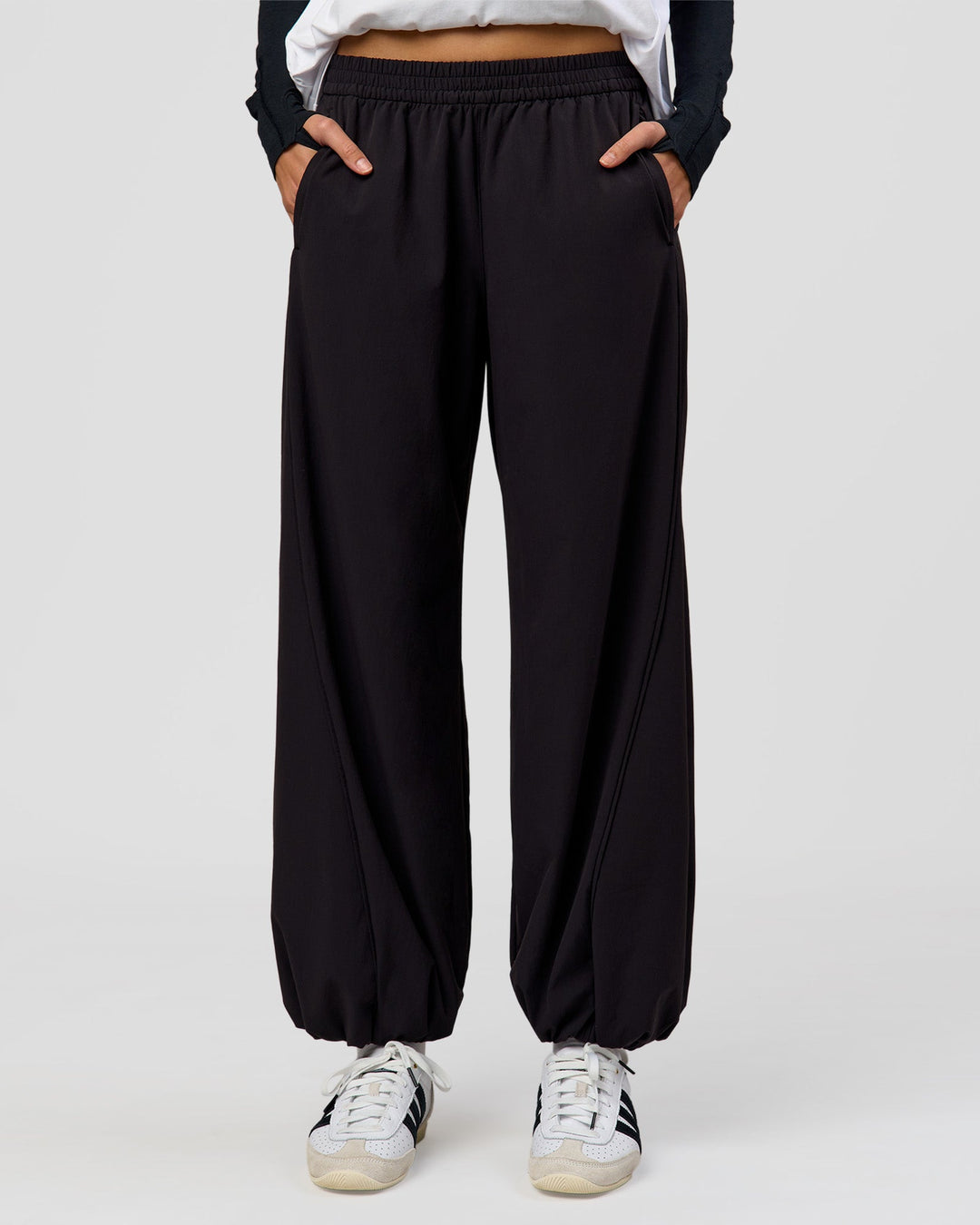 Woman wearing Stitch Up Track Pant - Black | Model:Taneisha | Size:XS - view 4