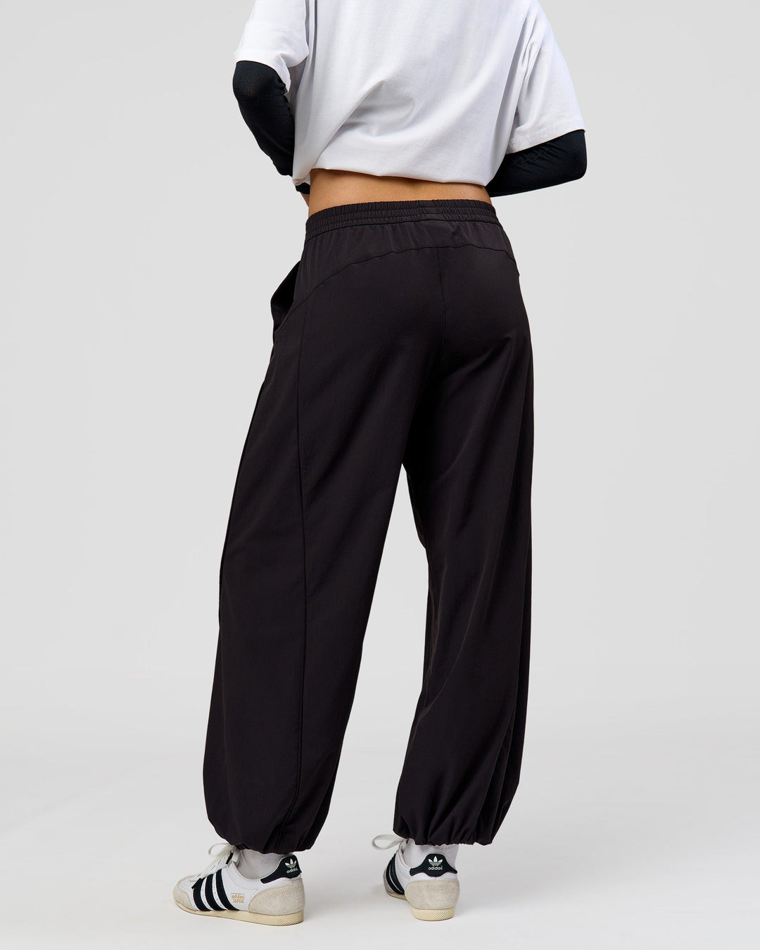 Woman wearing Stitch Up Track Pant - Black | Model:Taneisha | Size:XS - view 5