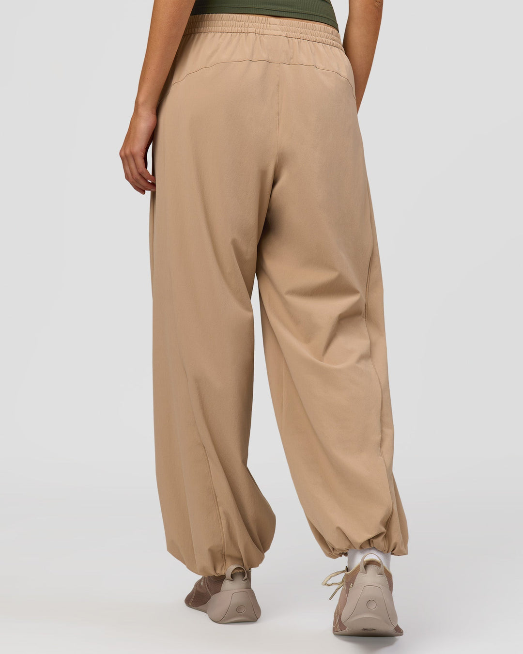 Woman wearing Stitch Up Track Pant - Warm Smoke | Model:Taneisha | Size:XS - view 5