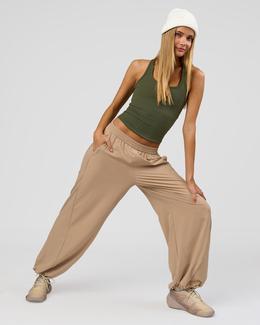 Woman wearing Stitch Up Track Pant - Warm Smoke | Model:Taneisha | Size:XS - view 6