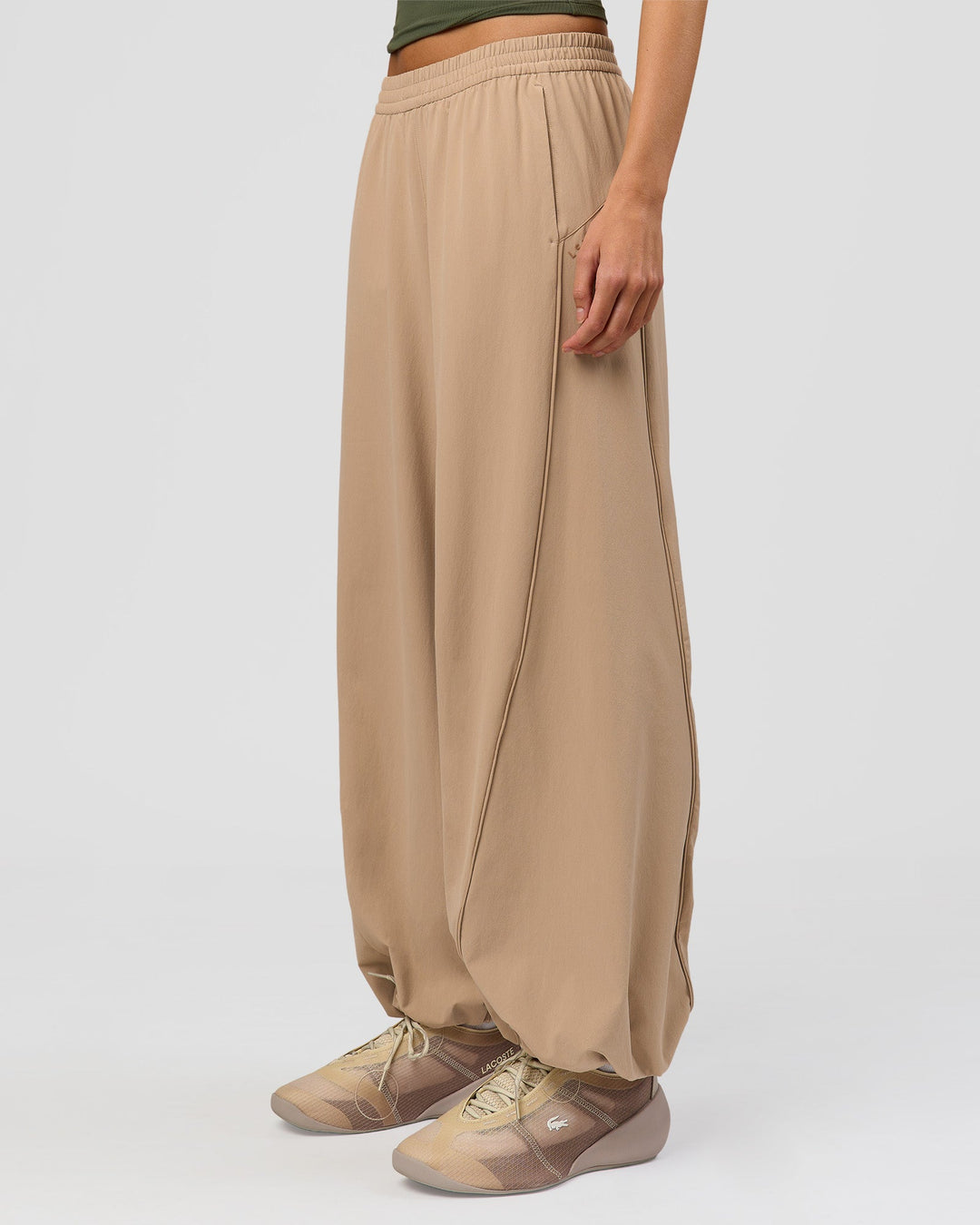 Woman wearing Stitch Up Track Pant - Warm Smoke | Model:Taneisha | Size:XS - view 9