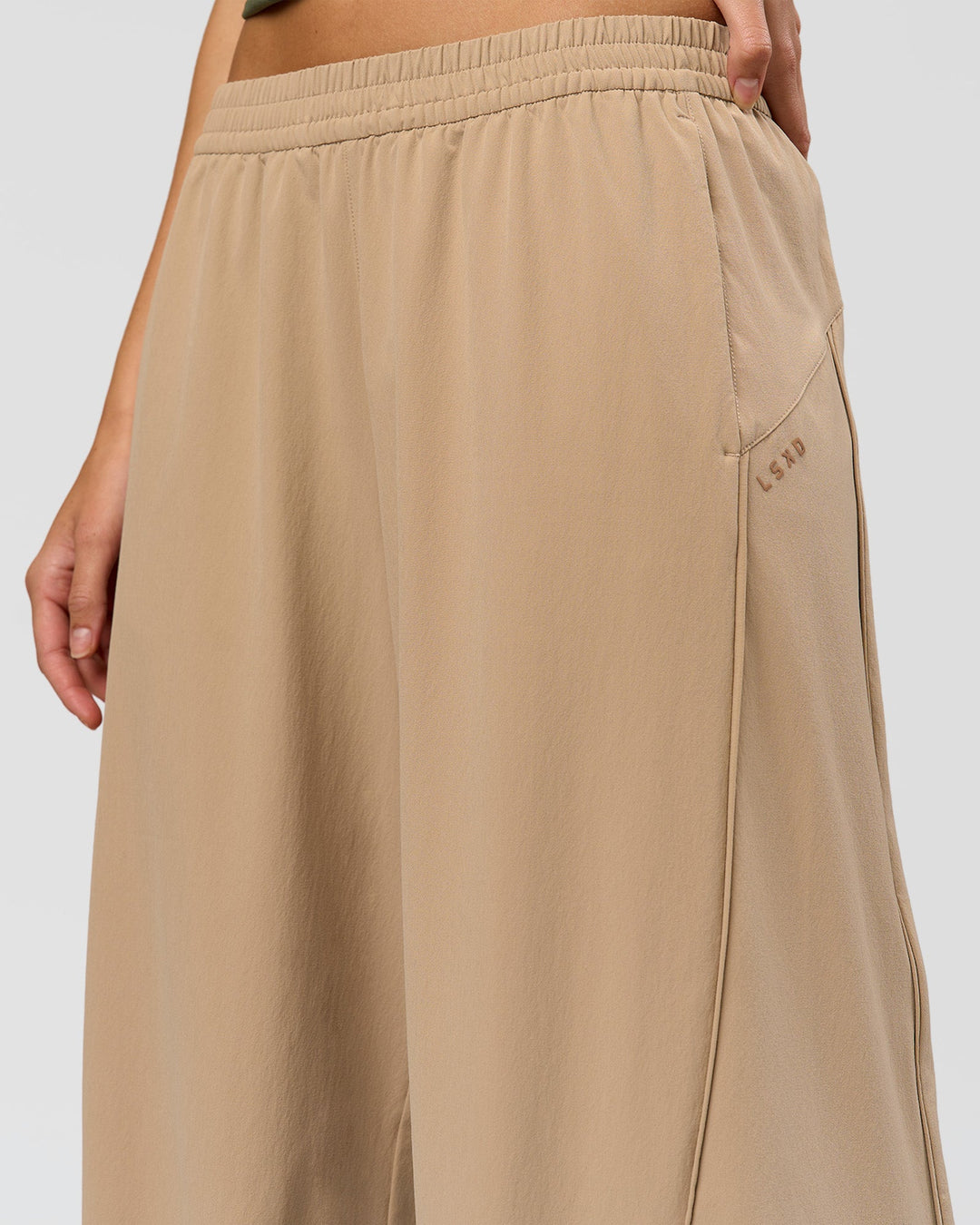 Woman wearing Stitch Up Track Pant - Warm Smoke | Model:Taneisha | Size:XS - view 11