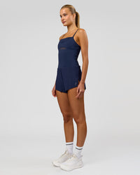 Woman wearing Tia-Clair Toomey-Orr Legacy 3" Run One-Piece - Future Navy | Model:Taneisha | Size:XS | Thumbnail Index: 8