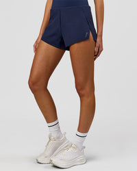 Woman wearing Tia-Clair Toomey-Orr Legacy 3" Run One-Piece - Future Navy | Model:Taneisha | Size:XS | Thumbnail Index: 12