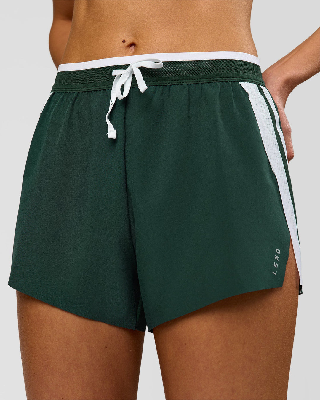 Woman wearing Trackline Accelerate 3" High-Rise Running Short - Midnight Green-White | Model:Taneisha | Size:XS - view 3