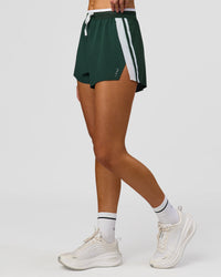 Woman wearing Trackline Accelerate 3" High-Rise Running Short - Midnight Green-White | Model:Taneisha | Size:XS | Thumbnail Index: 6