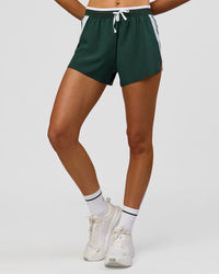 Woman wearing Trackline Accelerate 3" High-Rise Running Short - Midnight Green-White | Model:Taneisha | Size:XS | Thumbnail Index: 8