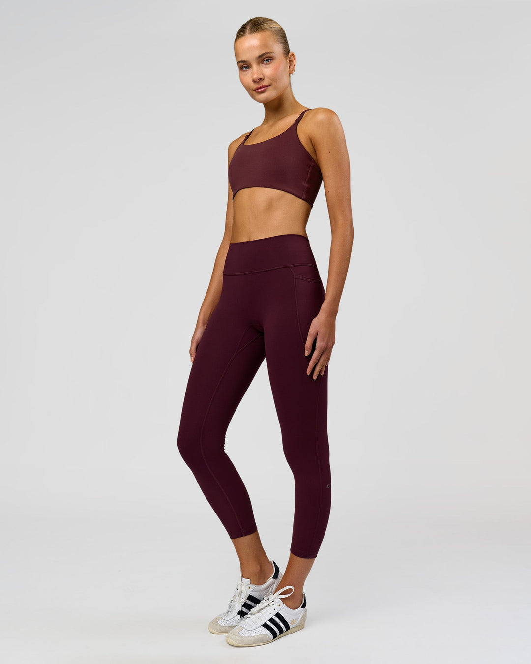 Woman wearing Twist Sports Bra - Cherry Lacquer | Model:Taneisha | Size:XS - view 5