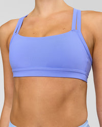 Woman wearing Velocity Sports Bra - Bluebell | Model:Taneisha | Size:XS | Thumbnail Index: 2