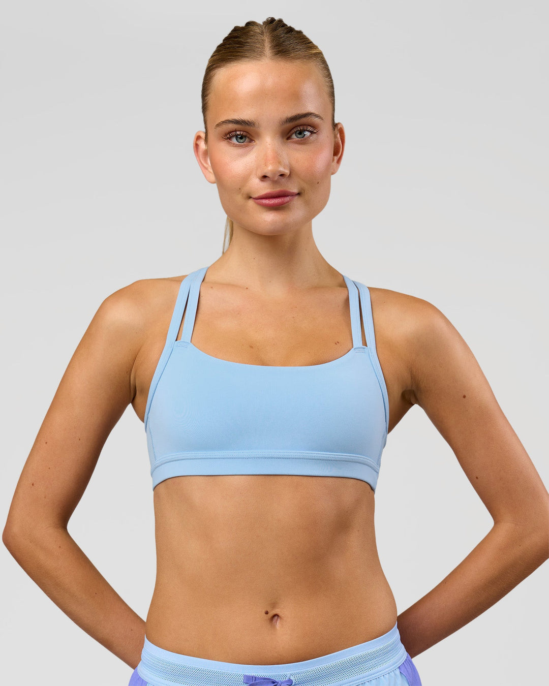 Woman wearing Velocity Sports Bra - Open Air | Model:Taneisha | Size:XS - view 4