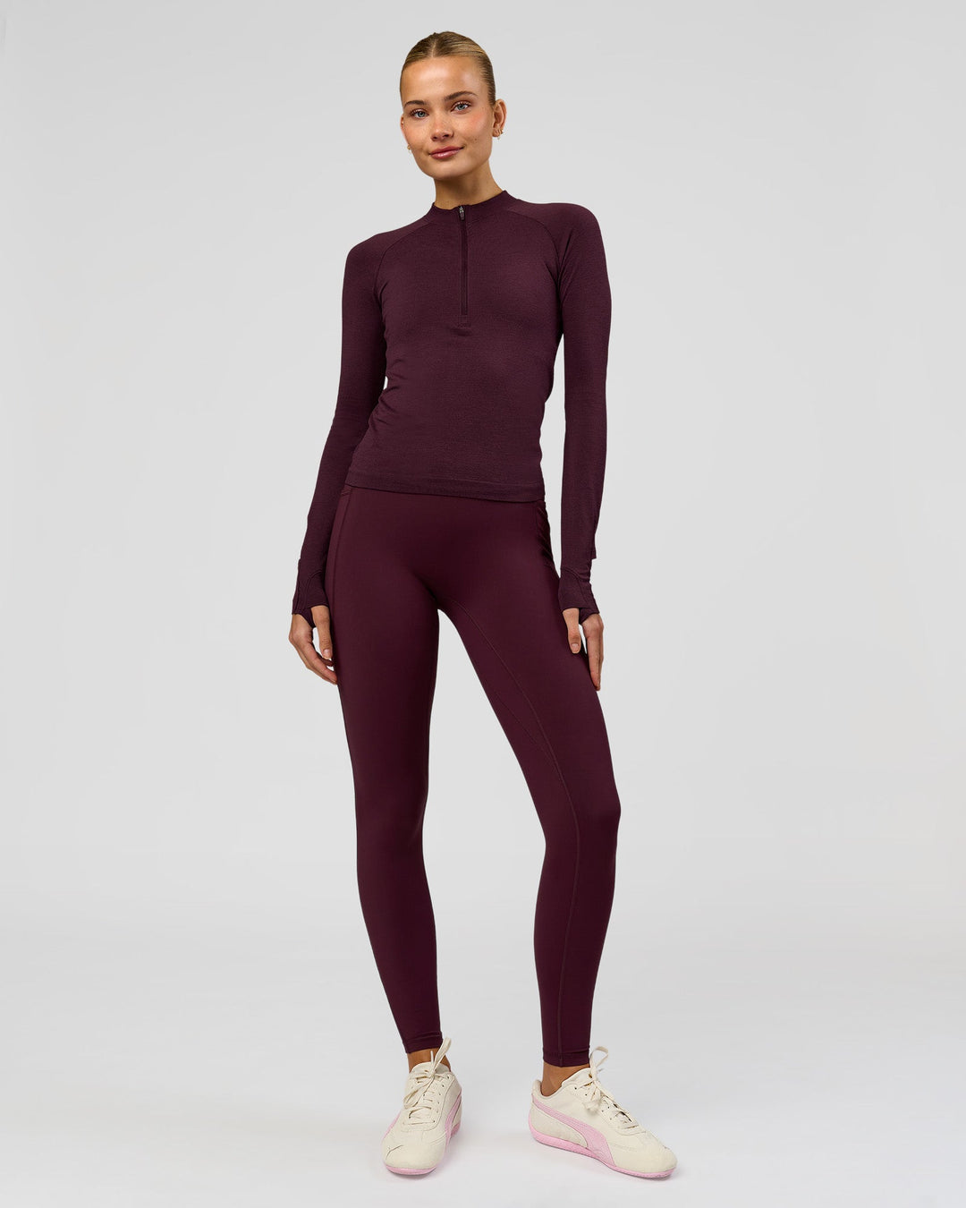 Woman wearing AeroFLX+ Long Sleeve Half Zip - Cherry Lacquer/Cherry Laquer | Model:Taniesha | Size:XS - view 9