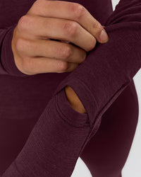 Woman wearing AeroFLX+ Long Sleeve Half Zip - Cherry Lacquer/Cherry Laquer | Model:Taniesha | Size:XS | Thumbnail Index: 10