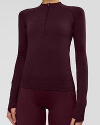 Woman wearing AeroFLX+ Long Sleeve Half Zip - Cherry Lacquer/Cherry Laquer | Model:Taniesha | Size:XS | Thumbnail Index: 11