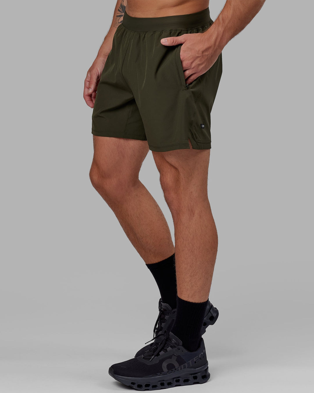 Man wearing Challenger 6" Lined Performance Short - Forest Night