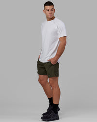 Man wearing Challenger 6" Performance Short - Forest Night