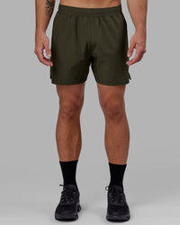 Man wearing Challenger 6" Performance Short - Forest Night