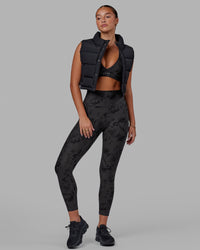 Woman wearing Fusion Ultra High-Rise 7/8 Legging Pockets - Black Tie-Dye | Model:Milly | Size:S