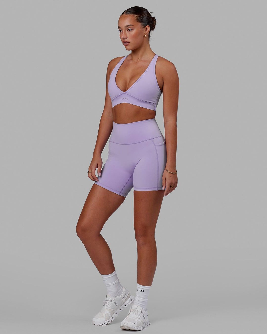 Woman wearing Fusion Ultra High-Rise 6" Short Pockets - Pale Lilac | Model:Milly | Size:S