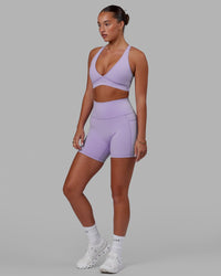 Woman wearing Fusion Ultra High-Rise 6" Short Pockets - Pale Lilac | Model:Milly | Size:S