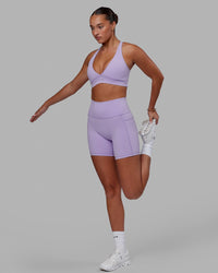 Woman wearing Fusion Ultra High-Rise 6" Short Pockets - Pale Lilac | Model:Milly | Size:S
