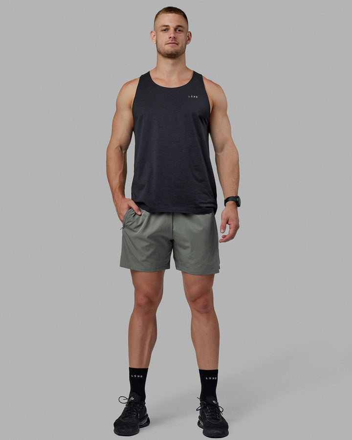 Man wearing Challenger 6" Lined Performance Short - Graphite