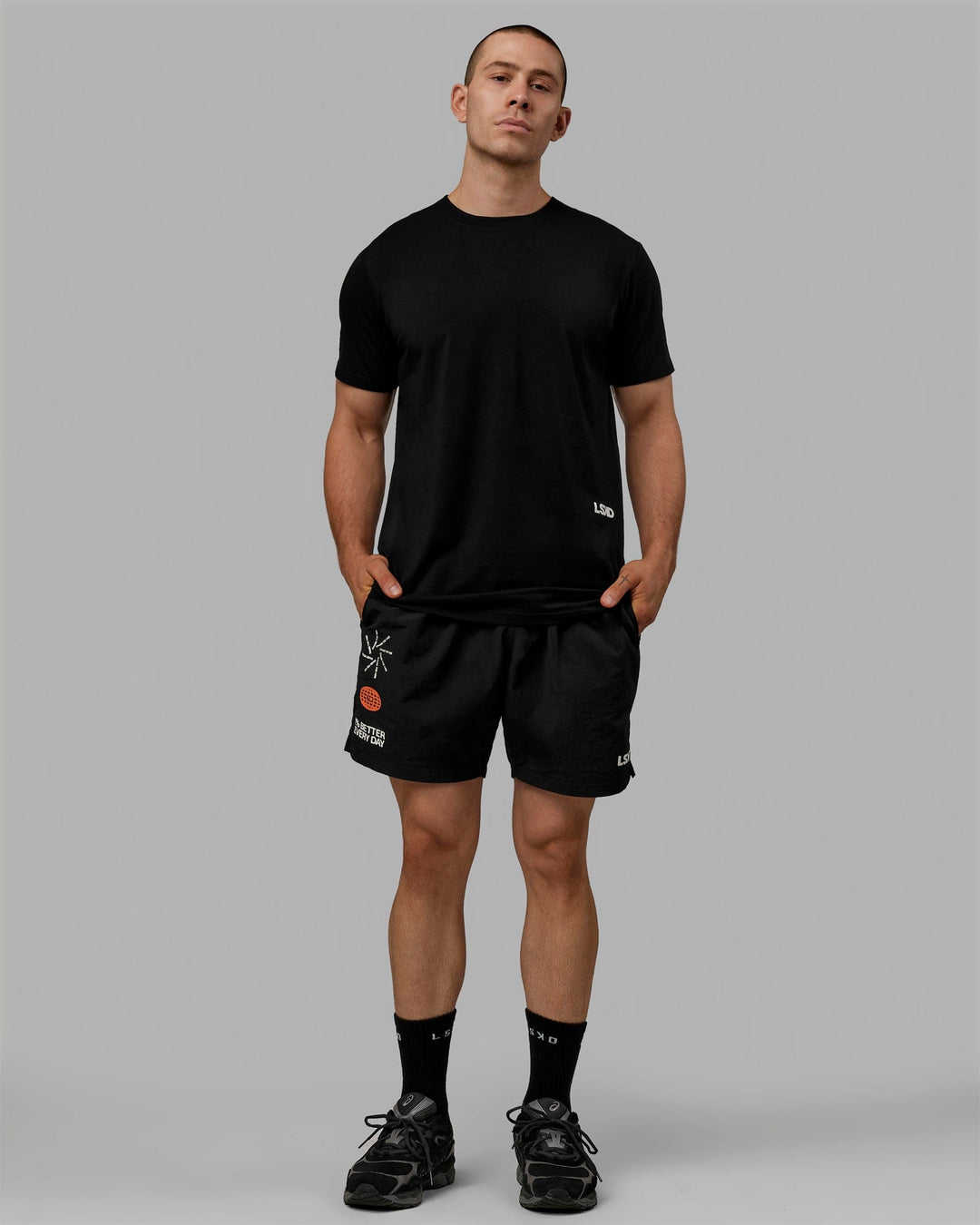 Man wearing Millennium 7" Shorts - Black