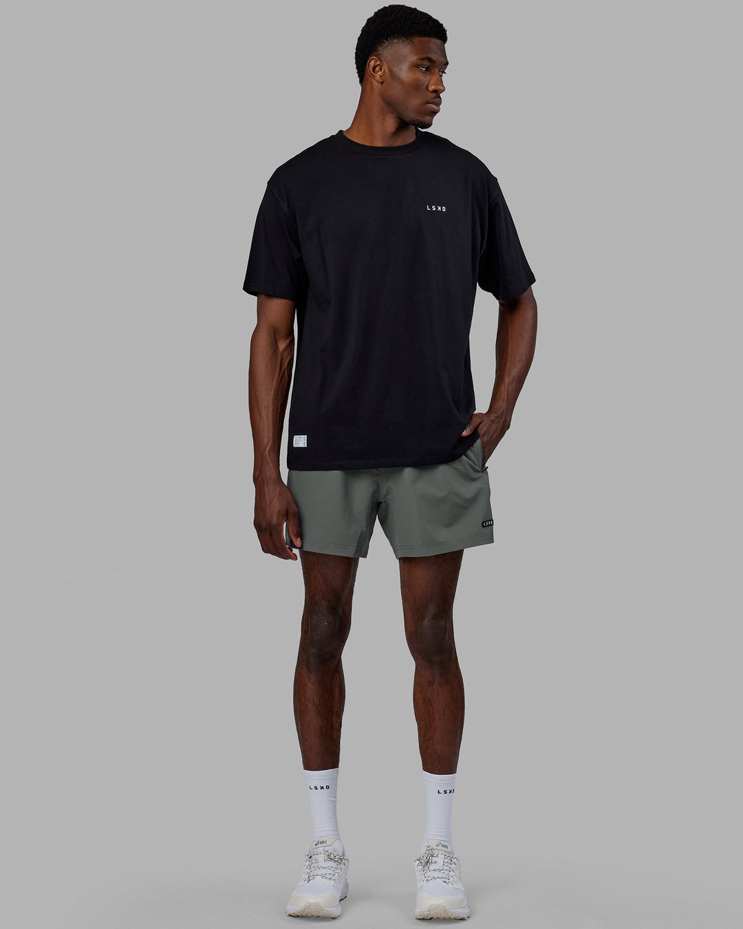 Man wearing Rep 5'' Performance Short - Graphite