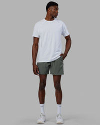 Man wearing Rep 7'' Performance Short - Graphite